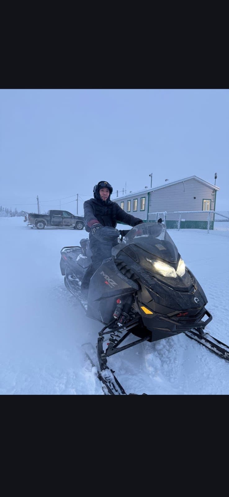Customer on a Ski-Doo MXZ in the snow
